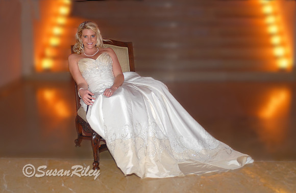 Bride near stairs, photographer Susan Riley