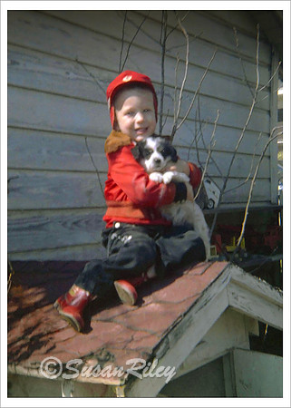 Boy with puppy.